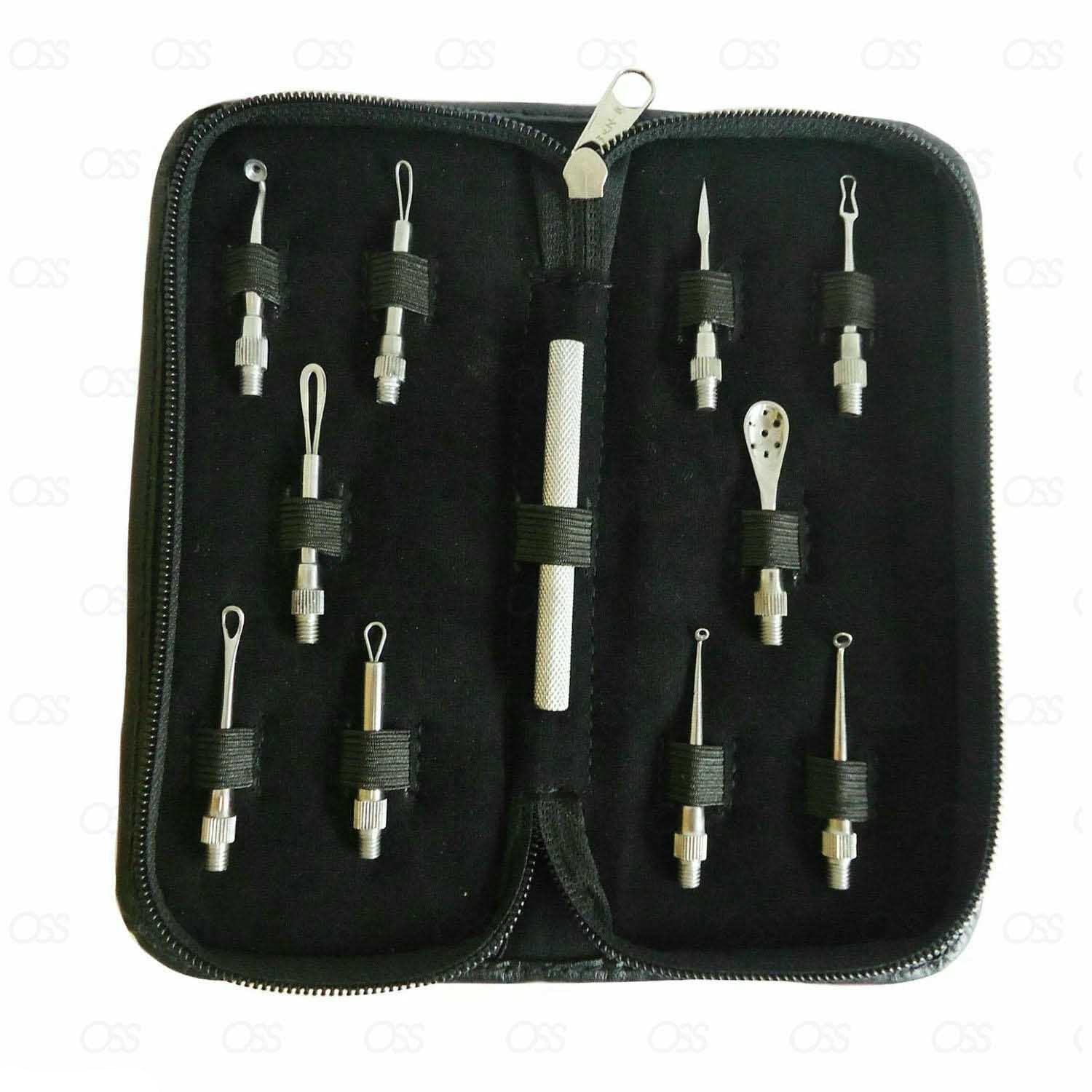 Set of fishing accessories in a black case on a white background