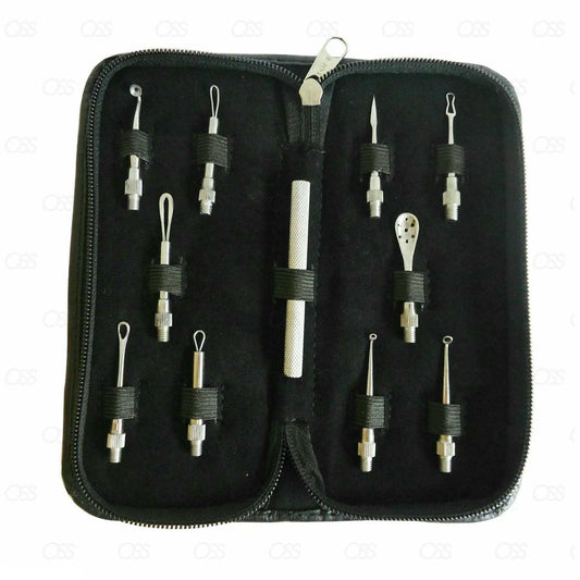 Set of fishing accessories in a black case on a white background